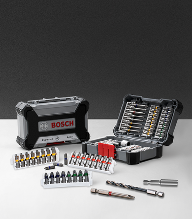 Drill and screwdriver bit set displayed in an open and closed plastic carrying case.