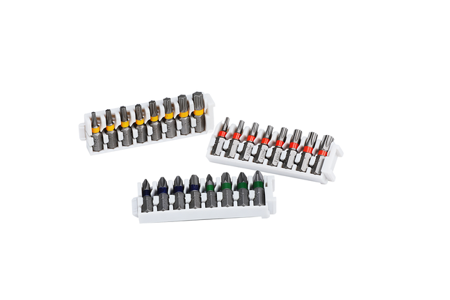 Three sets of assorted screwdriver bits in white plastic holders.