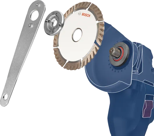 Diamond cutting disc with wrench and flange shown next to an angle grinder.