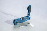 Bosch folding utility knife with spare blades.