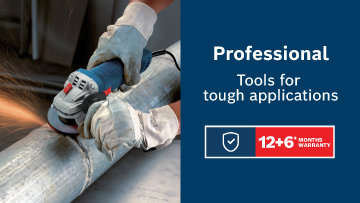 A person in gloves using a Bosch Professional angle grinder on a metal pipe.