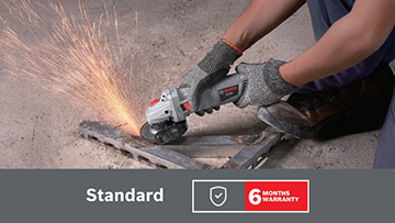 A person in gray gloves uses a Bosch Professional angle grinder on a metal piece, sparks flying.