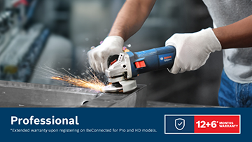 A person wearing white gloves uses a Bosch Professional angle grinder on a metal surface, creating sparks. The background is blurred, suggesting an industrial setting.